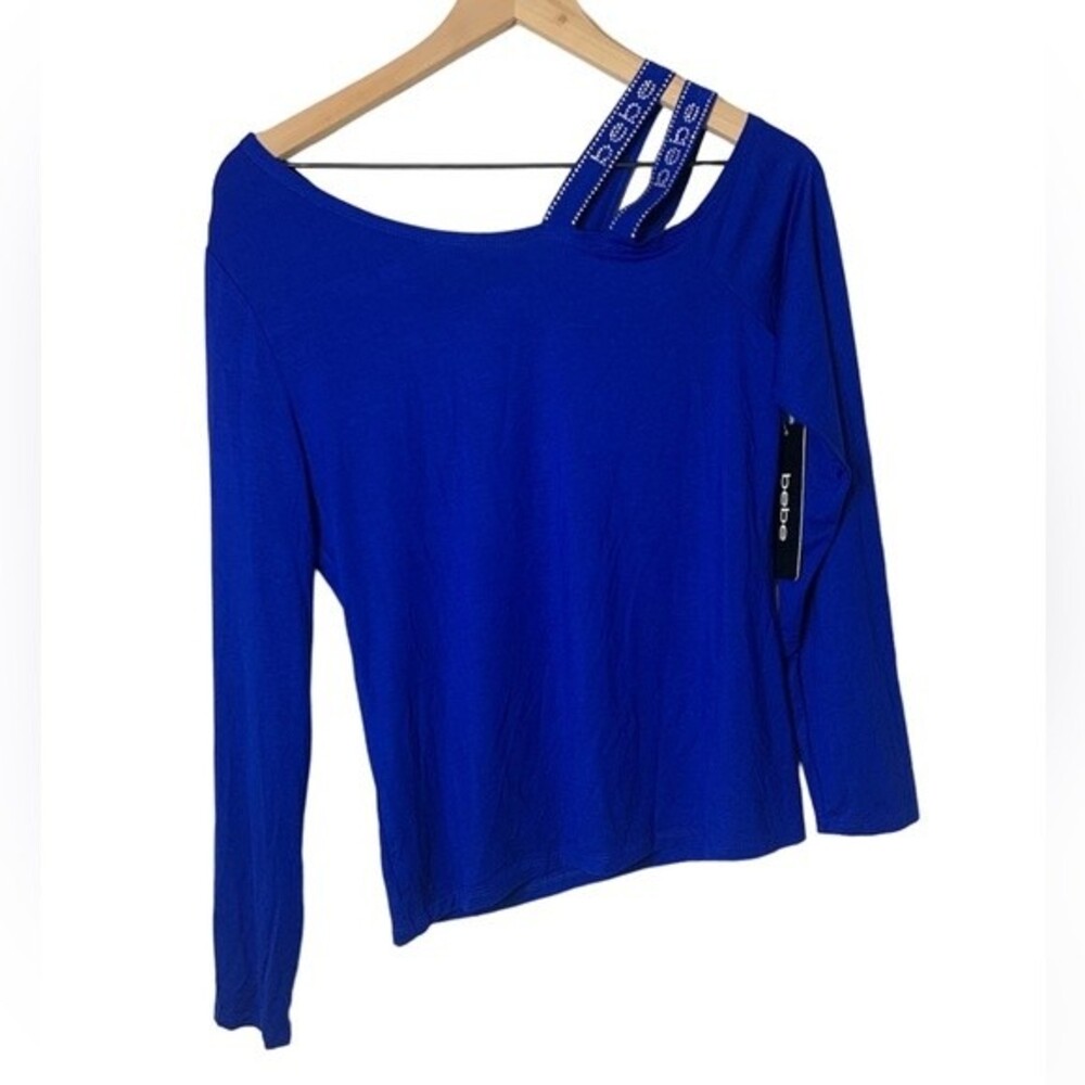 NWT BEBE LONG SLEEVE SOFT TOP WITH RHINESTONE LOGO EMBELLISHMENT. Size Small